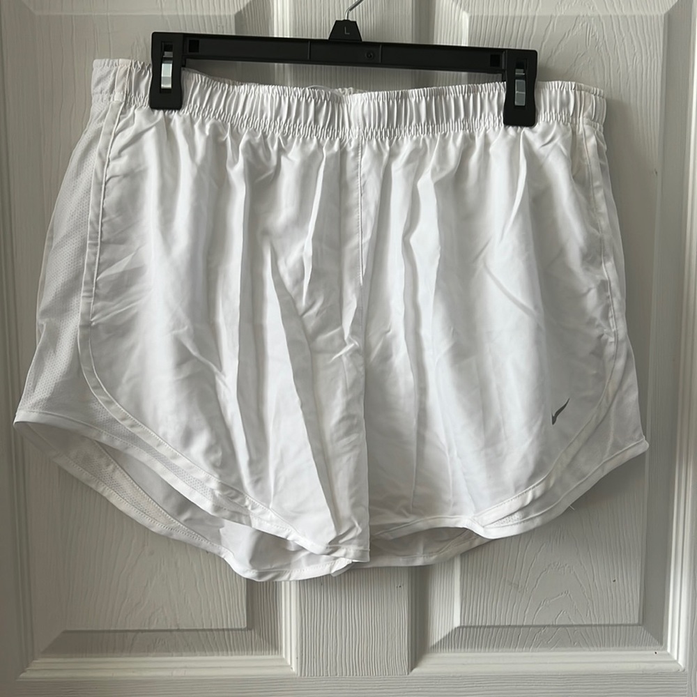 White Nike women’s running shorts